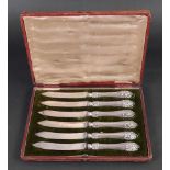 A cased set of six Edwardian silver handled fruit knives, Sheffield 1906,