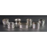 A group of seven silver napkin rings, mostly inscribed, 6.1ozs (7).