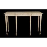 A modern limed oak breakfront side table with single frieze drawer on fluted tapering supports,