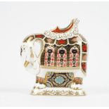 A Royal Crown Derby Imari decorated 'Elephant' paperweight, gold button to base, red printed marks,