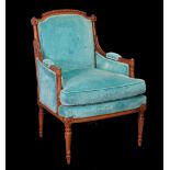 A Louis XVI style stained beech armchair on spiral twist reeded supports with teal blue upholstery,