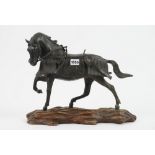 A Japanese patinated bronze horse, Meiji period, silver signature panel to base,