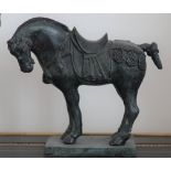 A patinated bronze horse, 23cm high.