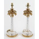 A pair of Italian gilt metal and crystal table lamps formed as palm trees,