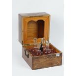 A Victorian rosewood and inlaid liqueur box, the interior fitted with a suite of glassware,