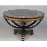 A modern Italian style black painted metal and parcel gilt faux marble topped centre table,