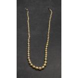 A single row graduated cultured pearl necklace, measuring from approximately 6.46mm to 3.