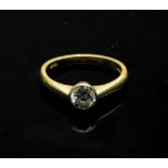 An 18ct gold single stone diamond ring,