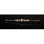 A cultured bouton pearl, seed pearl and