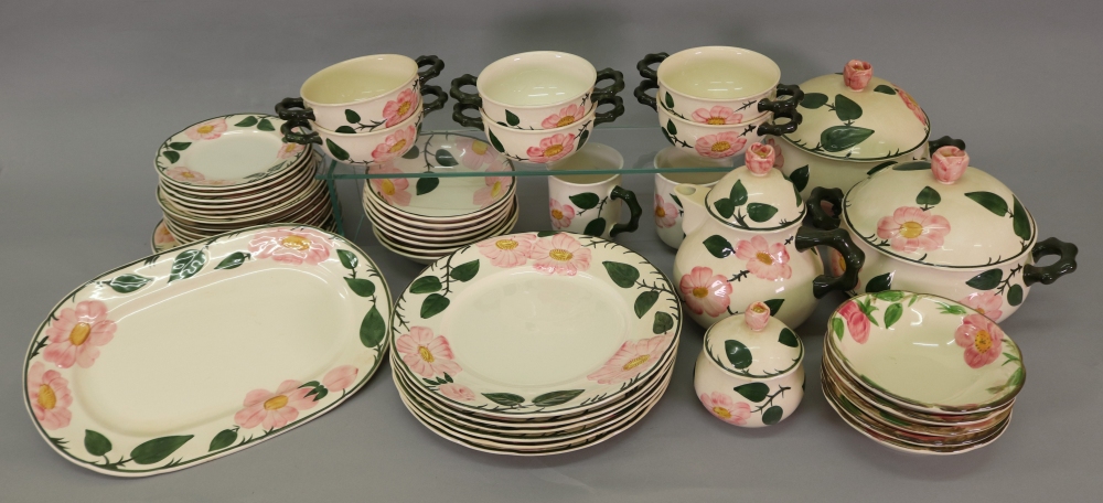 A Villeroy & Boch Wild-Rose 40-piece tea and dinner service and five similar pudding bowls (45).