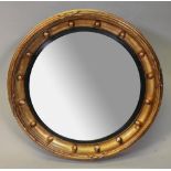 A small Regency style circular convex wall mirror, 19th century,