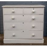 A Victorian later white painted pine chest, fitted with two short and three long drawers,