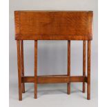 A light oak Sutherland tea table, with hinged drop leaves, 61cm wide x 20cm deep x 74cm high,