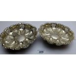 A pair of silver bon bon dishes with pierced decoration and ball feet, Birmingham 1897, approx 8.