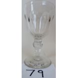 A large 19th century facet-cut glass goblet with teardrop stem,