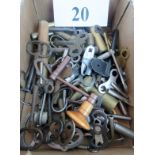 A collection of antique clock keys,