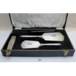 A four piece sterling silver dressing table set, comprising of hair brush, mirror,