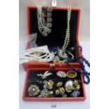 A red jewellery box containing a quantity of mainly vintage jewellery est: £15-£30