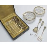 A set of twelve white metal French coffee spoons, boxed, a sardine server, pickle fork & spoon,