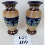 A pair of late 19th/early 20th century Doulton Lambeth pottery vases,