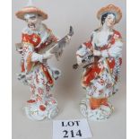 A large pair of Meissen 'Malabar' musician figures blue crossed sword marks to base,