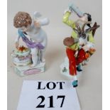 Two Meissen figures, harlequin drinking with goat and cupids' motto Je Les Enflamme,