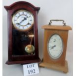 A modern striking wall clock, with key & pendulum, in glazed mahogany case,
