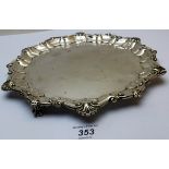 A silver salver with pie crust edge and ball & claw feet, approx 16oz, Birmingham 1901,