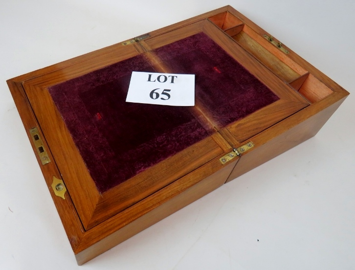 A Victorian walnut writing slope with inset brass escutcheons and nicely fitted interior est: