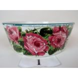 A Wemyss pottery circular bowl, painted with roses, retailed by Thomas Goode & Co, London,