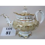 A mid 19th century English porcelain teapot and cover,