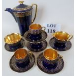 A Crown Devon Modane Art Deco coffee set, decorated in gilt over rich blue, coffee pot, milk jug,