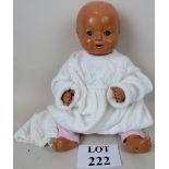 Mid 20th century composite material baby doll with sleeping eyes and growler (not working),