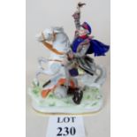 A 20th century Sitzendorf figure depicting soldier on rearing horse, mark S with crossed swords,