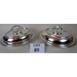 Two good quality early 20th century silver plated entree dishes & covers with handles, oval forms,