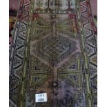A late 19th/20th century Persian rug (183 cm x 100 cm approx) est: £30-£50