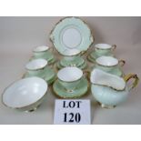 A Paragon fine bone china tea set with lavish gilt decoration, comprising 6 cups, 6 saucers,