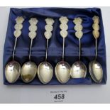 A set of 6 Chinese white metal teaspoons decorated with Chinese characters,