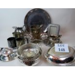 A quantity of silver plated items, including entree dish, ice bucket, photo frame, pitcher,