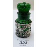 A green glass scent bottle with crown stopper, 'The Crown Perfumery Company London',