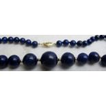 Fine grade lapis lazuli necklace, 14k yellow gold clasp & beads, 17" graduated single strand,