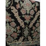 Abusson needlepoint William Morris style on black ground (306 x 244 cm approx) est: £160-£220