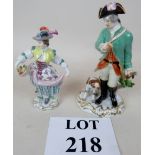 Two Meissen figures, hunter with dogs, approx 17 cm, and woman with basket, approx 15 cm,