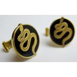 A pair of 18ct gold and black enamel cuff links with serpent decoration, Theo Fennell,