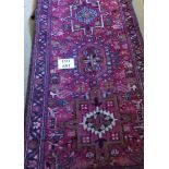 A mid 20th century Persian Hamadan runner (418 cm x 73 cm approx) est: £400-£600