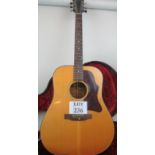 A Gibson J55 acoustic 1974/75 guitar, paper label inside, in a hard case est: £1,100-£1,