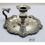 A Victorian silver chamber stick with shell decoration, Sheffield 1850, approx 8.