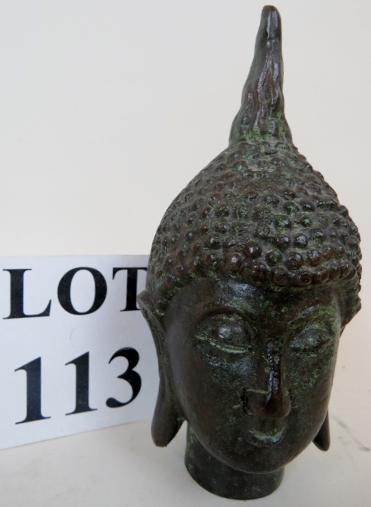 A Chinese bronze head of Buddha, old but not ancient, probably c.