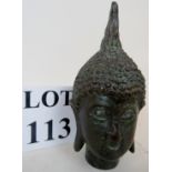 A Chinese bronze head of Buddha, old but not ancient, probably c.