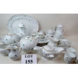 A continental porcelain 14 piece part coffee & dinner service decorated with green flowers,